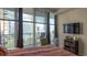 Bedroom featuring floor to ceiling windows overlooking city skyline at 3338 Peachtree Ne Rd # 1506, Atlanta, GA 30326
