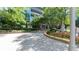 Landscaped entrance to a modern building with a well-maintained garden at 3338 Peachtree Ne Rd # 1506, Atlanta, GA 30326