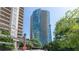 Modern high-rise apartment building with reflective glass and private balconies at 3338 Peachtree Ne Rd # 1506, Atlanta, GA 30326