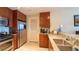 Well-lit kitchen features stainless steel appliances and tile flooring at 3338 Peachtree Ne Rd # 1506, Atlanta, GA 30326