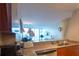Open concept kitchen with granite countertops and stainless steel appliances at 3338 Peachtree Ne Rd # 1506, Atlanta, GA 30326
