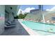 Well-maintained pool area features lounge chairs, lush landscaping, and a sunny ambiance at 3338 Peachtree Ne Rd # 1506, Atlanta, GA 30326