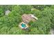 Expansive estate boasting a brick home, swimming pool, and verdant, mature trees at 7660 Treeridge Ct, Atlanta, GA 30350