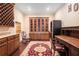 Game room featuring built in shelving, wooden desk and chairs at 7660 Treeridge Ct, Atlanta, GA 30350