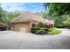 Spacious brick home with a two-car garage, manicured landscaping, and inviting curb appeal at 7660 Treeridge Ct, Atlanta, GA 30350