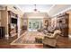 Bright and spacious living room with hardwood floors, fireplace, and large windows offering natural light at 7660 Treeridge Ct, Atlanta, GA 30350