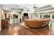 Bright living room with hardwood floors, large windows, coffered ceiling and a fireplace at 7660 Treeridge Ct, Atlanta, GA 30350