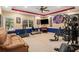 Well-equipped workout room featuring an Atlanta Braves logo, treadmill, and stationary bike at 7660 Treeridge Ct, Atlanta, GA 30350