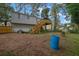 Backyard with a deck, stairs, and a few items on the ground, presenting potential for outdoor enjoyment at 1377 Tucker Woods Dr, Norcross, GA 30093