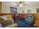 Inviting living room with plush seating, vintage décor, and natural light at 1377 Tucker Woods Dr, Norcross, GA 30093
