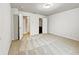 Vacant bedroom with neutral walls, plush carpet, and two closets at 2138 Chadwick Sw Rd, Atlanta, GA 30331