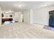 Spacious open-concept living area with new carpet and hardwood-style floors at 2138 Chadwick Sw Rd, Atlanta, GA 30331
