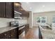 Stylish kitchen with granite counters, stainless appliances, and ample cabinet space at 255 Orchard Dr, Covington, GA 30014