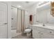 Clean bathroom with shower and tub combination and neutral finishes at 2721 Grapevine Cir # 1701, Cumming, GA 30041