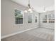 Bright dining area with large windows and a modern chandelier at 2721 Grapevine Cir # 1701, Cumming, GA 30041