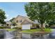 Inviting townhouse showcases manicured landscaping, attached garage, and classic design elements at 2721 Grapevine Cir # 1701, Cumming, GA 30041
