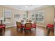 Meeting room with natural light, a round table, and comfortable chairs, perfect for gatherings at 2721 Grapevine Cir # 1701, Cumming, GA 30041