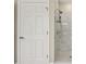 Modern shower featuring a dual shower head and a white marble tile surround at 2721 Grapevine Cir # 1701, Cumming, GA 30041