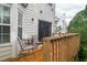 Inviting back deck area with wood finish, seating area, and views of the landscaped backyard at 4336 Thorngate Ln, Acworth, GA 30101
