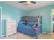 Bright bedroom with a bunk bed and a dresser, perfect for children at 4336 Thorngate Ln, Acworth, GA 30101