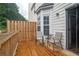 Outdoor deck with seating area and privacy fence for enjoying the outdoors at 4336 Thorngate Ln, Acworth, GA 30101
