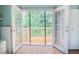 View of a deck through white French doors in an office space at 4336 Thorngate Ln, Acworth, GA 30101