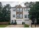 Charming townhome featuring stone accents, blue shutters, and a one-car garage at 4336 Thorngate Ln, Acworth, GA 30101