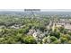 Aerial view showcasing the property's location within a lush, green neighborhood close to downtown Norcross at 5971 Brundage Lane, Norcross, GA 30071