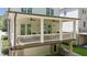 Rear view of covered back porch featuring french doors and railing at 5971 Brundage Lane, Norcross, GA 30071