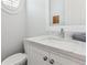 Close-up of a modern bathroom with white cabinets, marble countertop, and stylish fixtures at 5971 Brundage Lane, Norcross, GA 30071