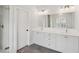 Primary bathroom features a dual sink vanity and walk-in shower at 5971 Brundage Lane, Norcross, GA 30071