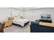 Spacious bedroom with king bed, two nightstands, and a large TV at 5971 Brundage Lane, Norcross, GA 30071