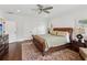 Primary bedroom with a king bed, hardwood floors, and white trim at 5971 Brundage Lane, Norcross, GA 30071