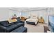 Spacious bedroom with king bed, sofa and large television at 5971 Brundage Lane, Norcross, GA 30071