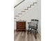 Hallway nook with classic side table and elegant chair at 5971 Brundage Lane, Norcross, GA 30071