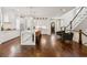Spacious open-concept kitchen features an island, breakfast bar, and ample storage at 5971 Brundage Lane, Norcross, GA 30071