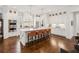 Spacious kitchen with a large island, stainless appliances, and hardwood floors at 5971 Brundage Lane, Norcross, GA 30071
