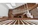 Classic wooden staircase with white railings and dark wood treads at 5971 Brundage Lane, Norcross, GA 30071