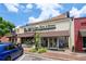 B&W Burgers storefront featuring a rooftop patio, outdoor seating, and ample street parking at 5971 Brundage Lane, Norcross, GA 30071