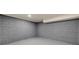 Basement room with painted floors and concrete block wall with a single window at 2254 Glendale Dr, Decatur, GA 30032