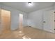 Bright bedroom with closet access, complemented by white walls and light wood floors at 2254 Glendale Dr, Decatur, GA 30032