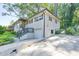 Charming home with beautiful curb appeal featuring a brick exterior, front steps, and driveway at 2254 Glendale Dr, Decatur, GA 30032