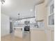 Modern kitchen featuring stainless steel appliances, white cabinetry, and a central island at 2254 Glendale Dr, Decatur, GA 30032