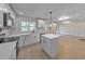 Open kitchen layout featuring white cabinets, a center island, and modern finishes at 2254 Glendale Dr, Decatur, GA 30032