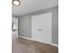 Bedroom with wall to wall closets and neutral carpet at 320 Roland Manor Dr, Dacula, GA 30019