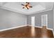 Spacious bedroom features wood floors, trey ceiling, and walk in closet at 320 Roland Manor Dr, Dacula, GA 30019