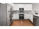 Well-equipped kitchen with stainless steel appliances and ample counter space at 320 Roland Manor Dr, Dacula, GA 30019
