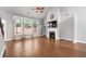 Bright living room with high ceilings and cozy fireplace at 320 Roland Manor Dr, Dacula, GA 30019