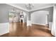 Spacious living room with hardwood floors, fireplace, and ample light at 320 Roland Manor Dr, Dacula, GA 30019