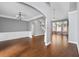 Bright, spacious living room features gleaming hardwood floors at 320 Roland Manor Dr, Dacula, GA 30019